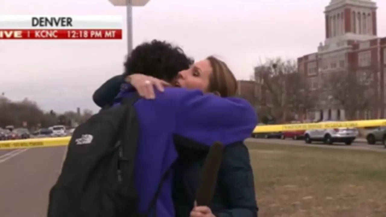 Fox News reporter reunites with son while reporting LIVE on high school shooting