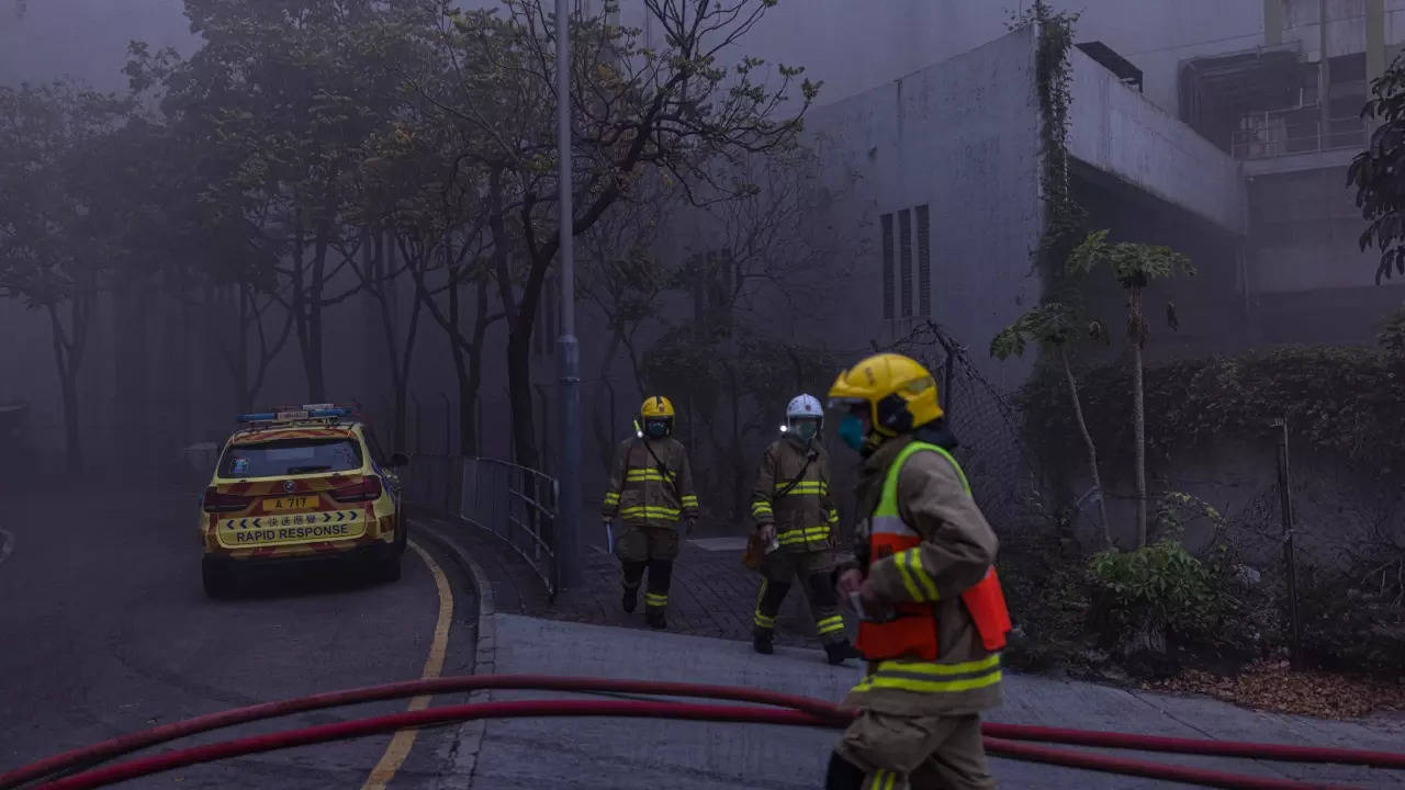 in pics: major fire startles hong kong; over 3,400 people forced out of homes