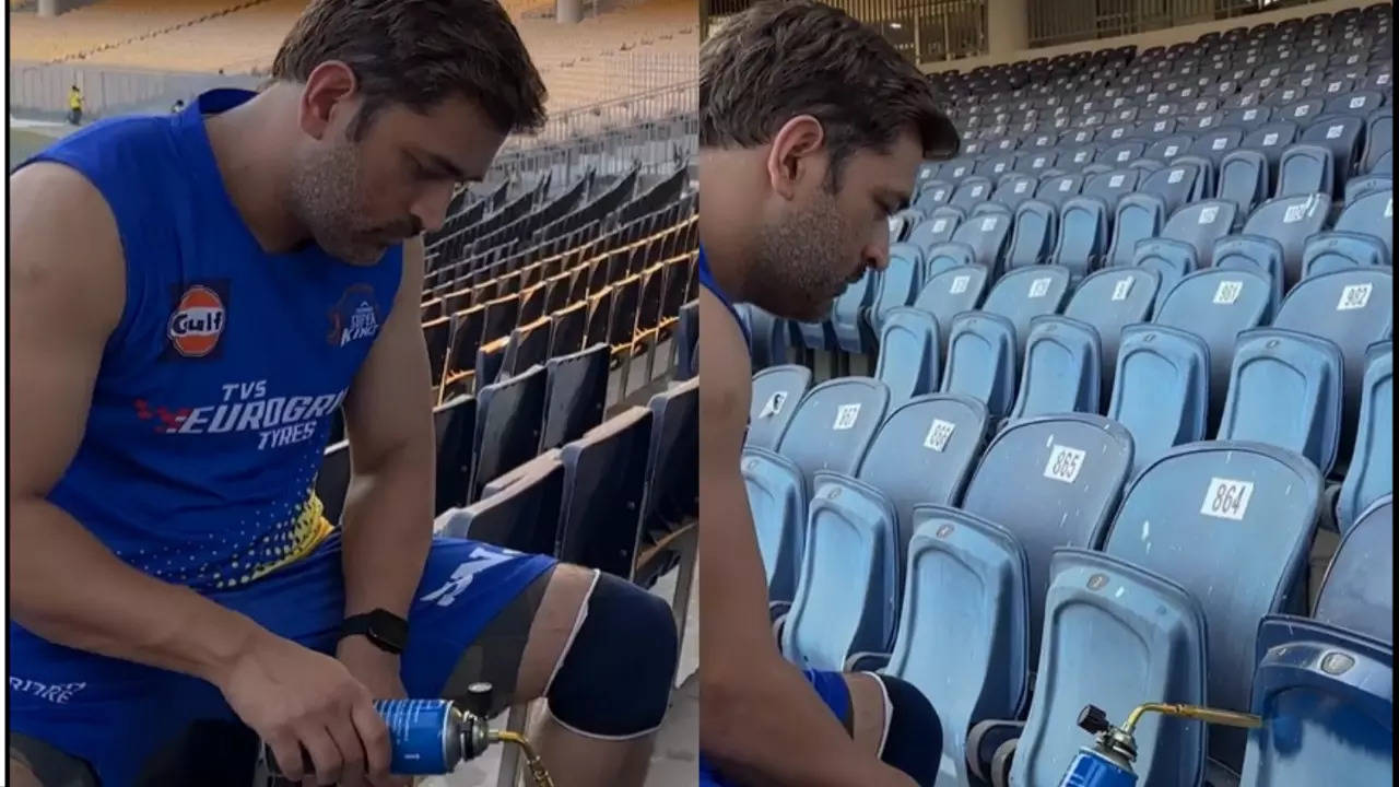 MS Dhoni painting seats at Chepauk