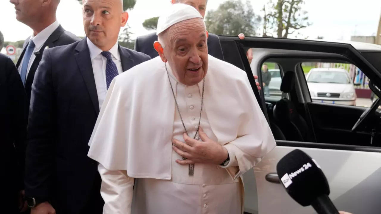 Pope Francis talks with journalists as he leaves the Agostino Gemelli University Hospital in Rome-AP