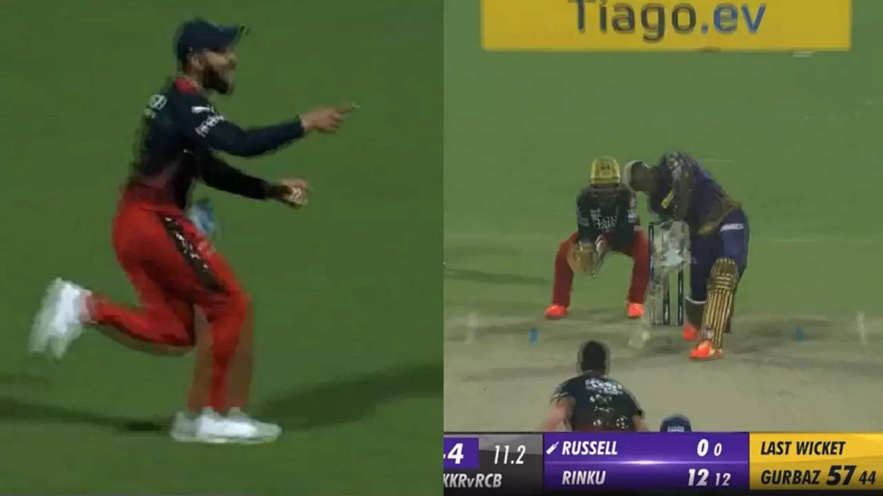 Virat Kohli celebrates Andre Russell's wicket.