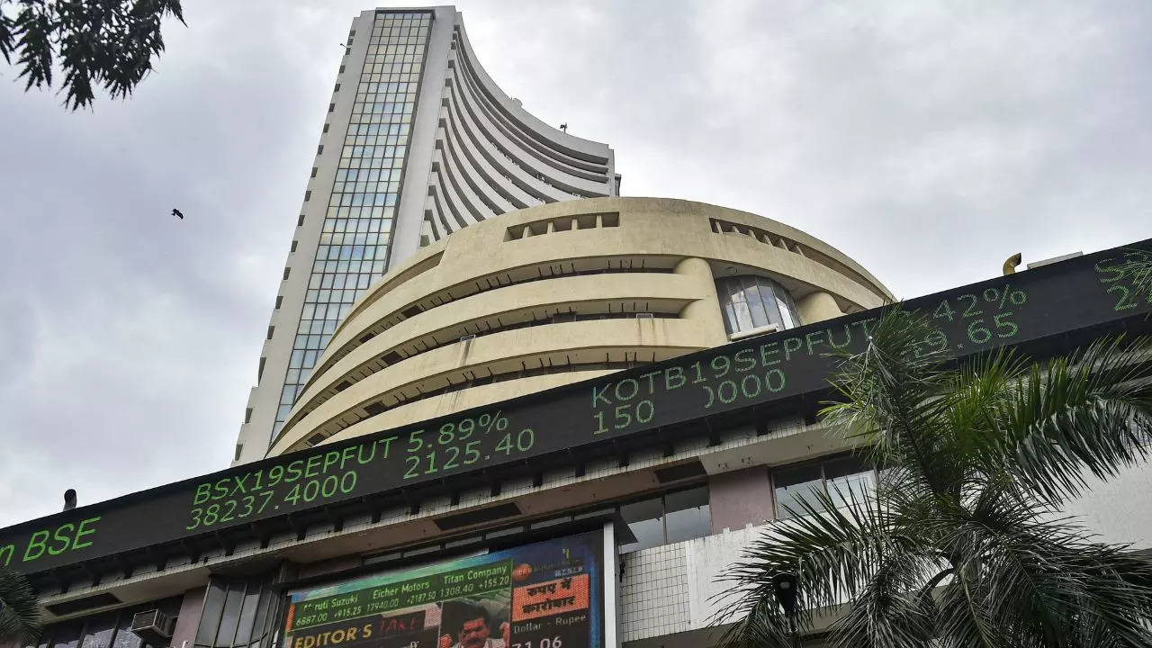 Stock Markets Today April 10: Closing Bell - Sensex, Nifty end volatile session flat; auto shares rally on Q4 business updates