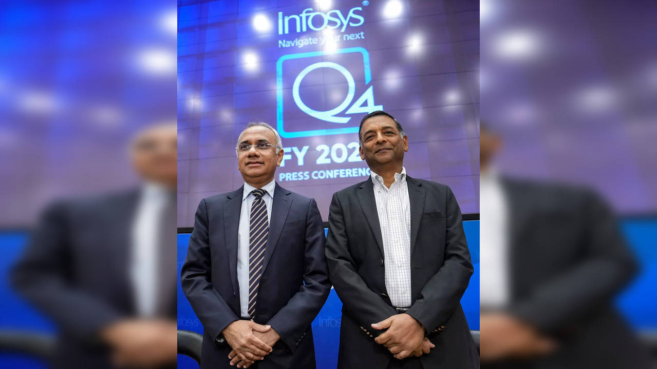 Bengaluru: Infosys CEO Salil Parekh (left) with CFO Nilanjan Roy during a press...