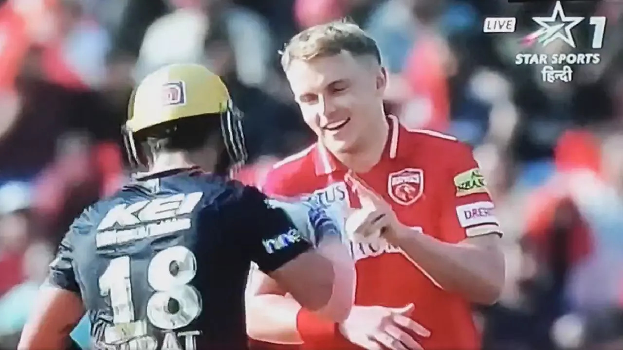 Virat Kohli punches Sam Curran.