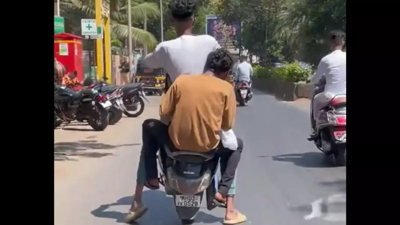 Caught on camera: Helmet-less Mumbai Daredevil Performs Wheelie on ...