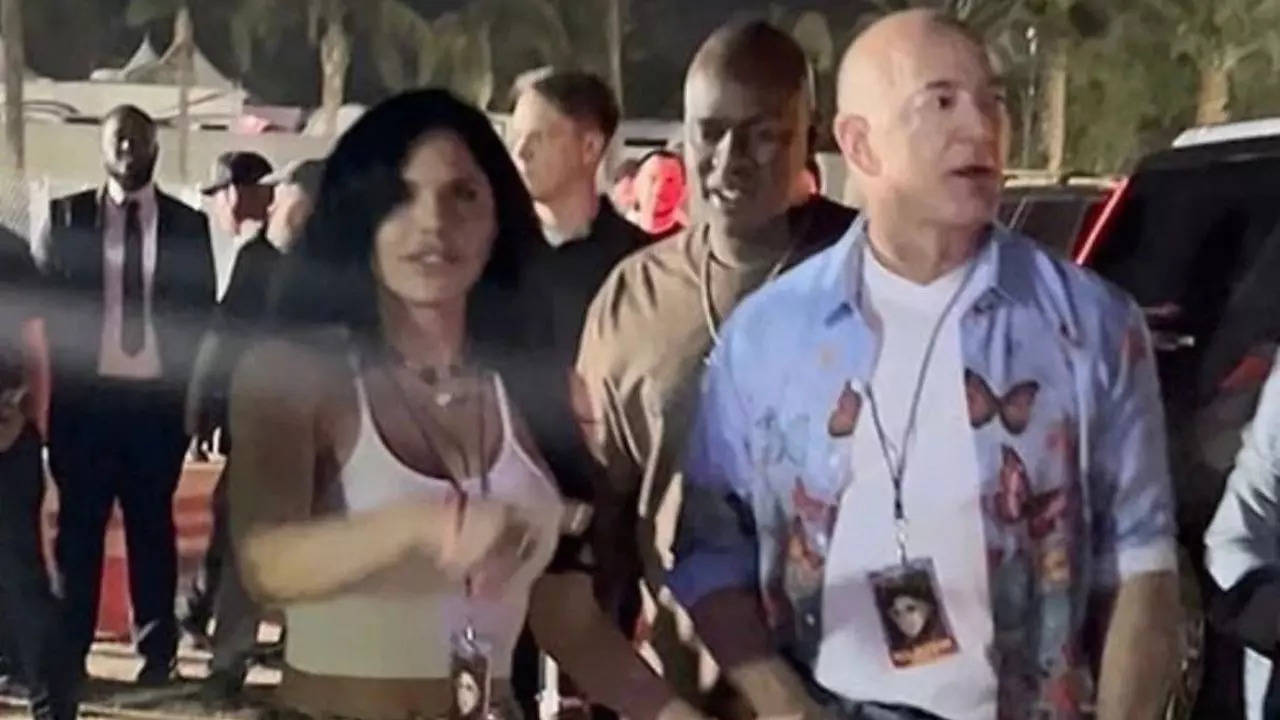 Amazon CEO Jeff Bezos pictured with his girlfriend Lauren Sanchez at the Coachella Valley Music and Arts Festival in California | Image credit: @pitdesi/Twitter