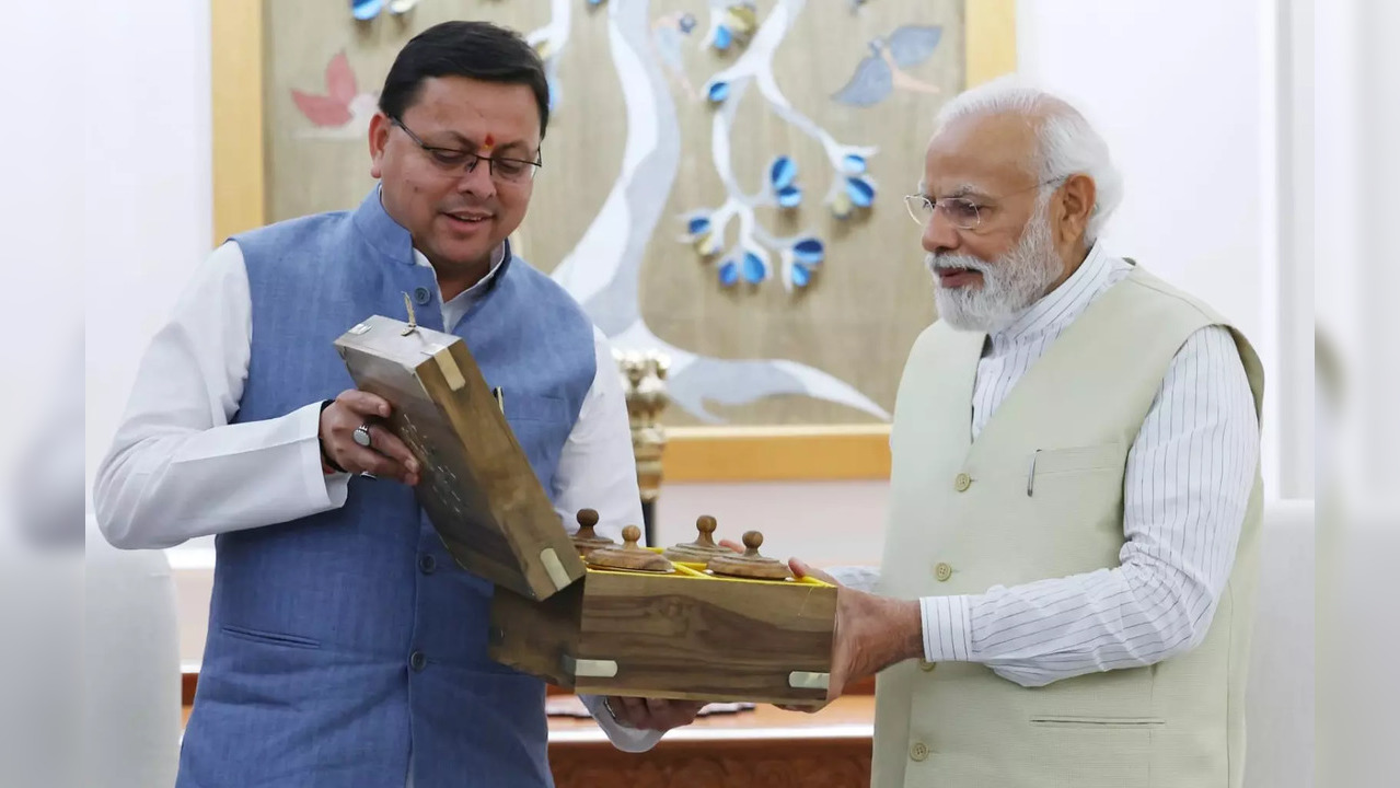 Pushkar dhami and modi